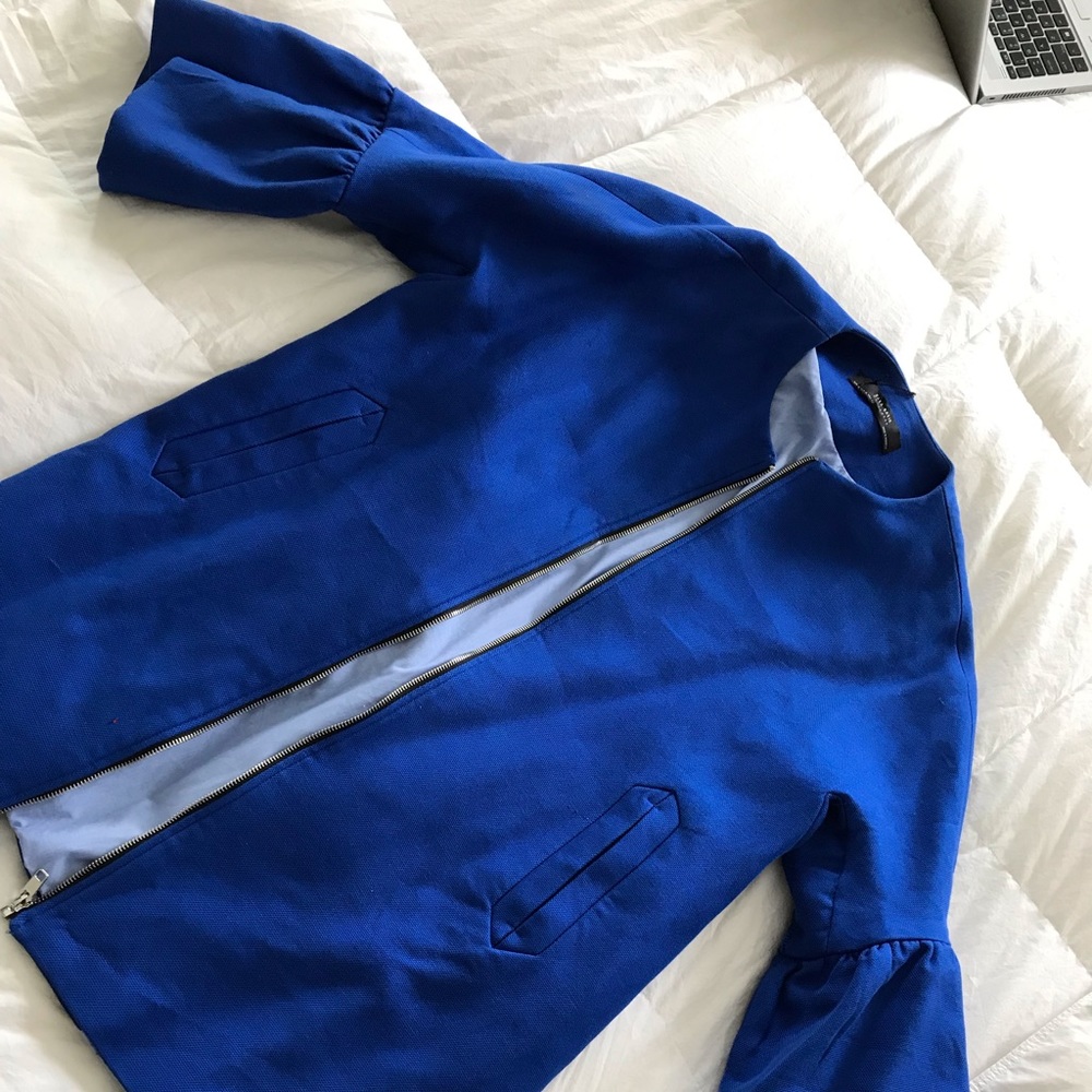 Blue jacket with bell sleeves